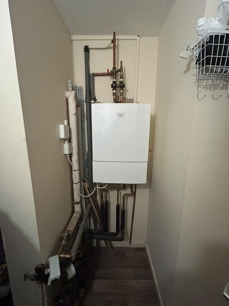 New heat interface unit fitted in a cupboard