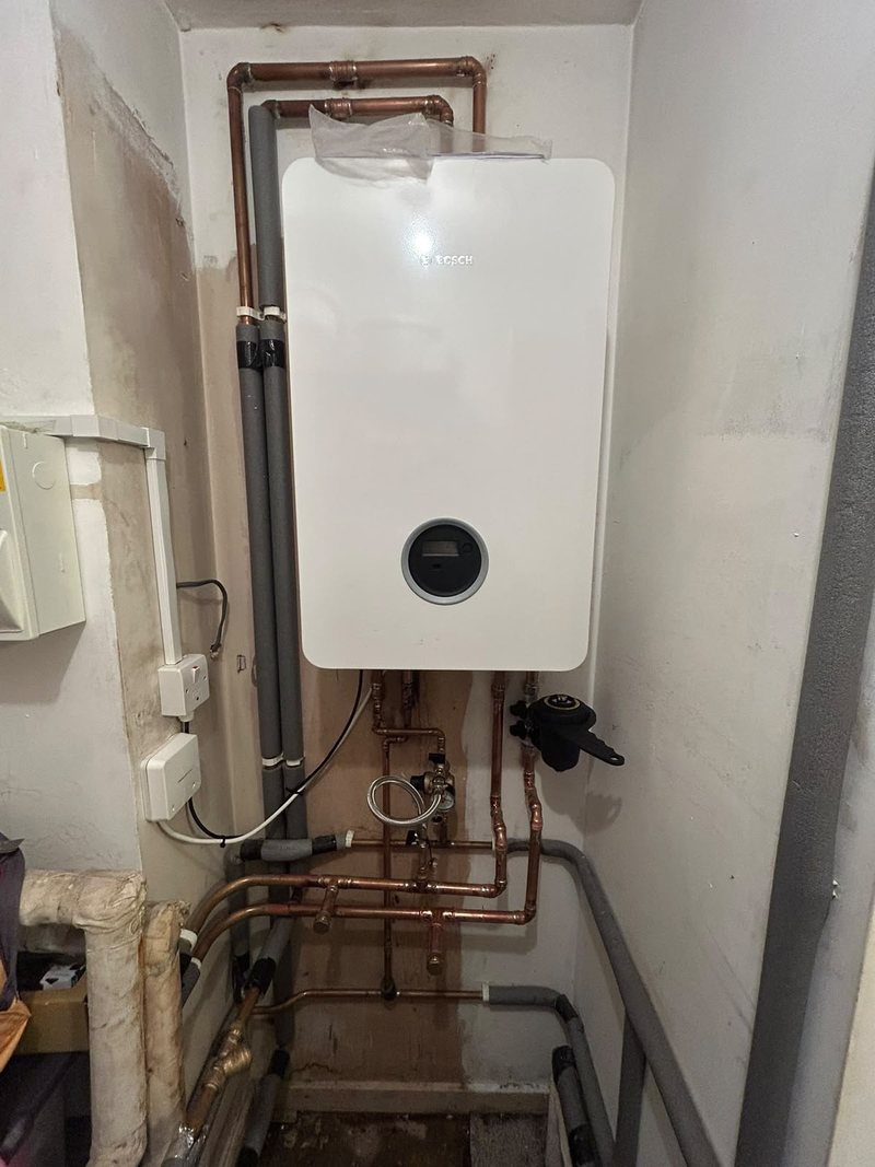 New heat interface unit fitted in a cupboard