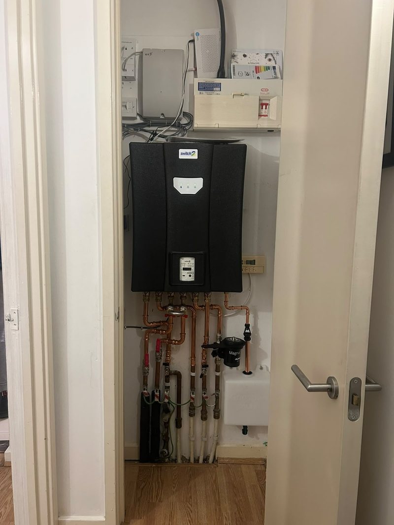 New heat interface unit fitted in a cupboard