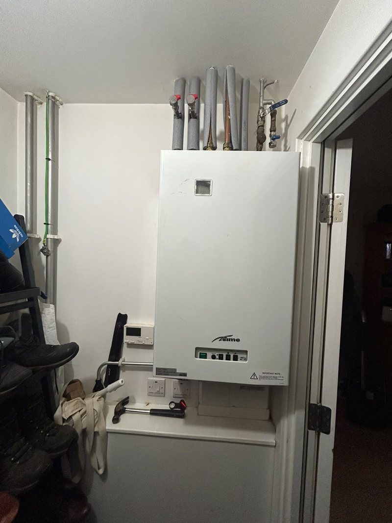 New heat interface unit fitted in a cupboard