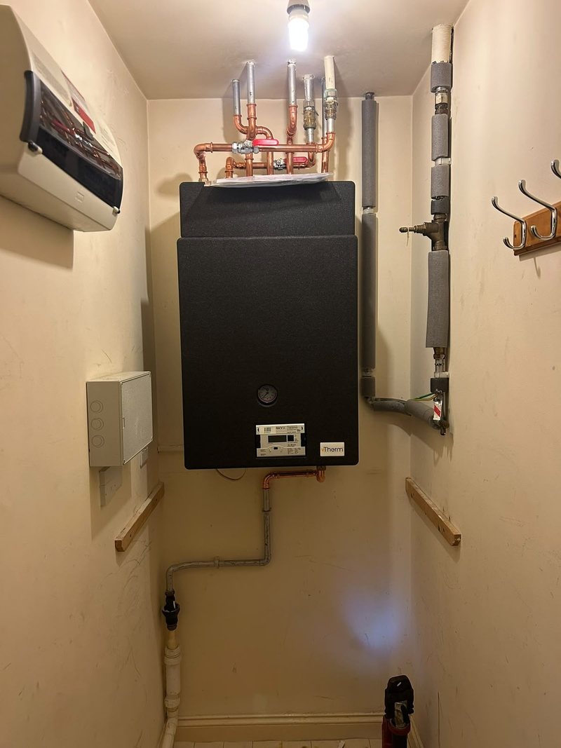 New heat interface unit fitted in a cupboard