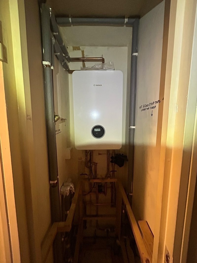 New heat interface unit fitted in a cupboard