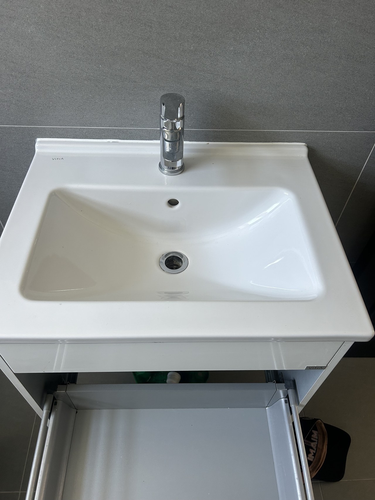 Vanity basin and tap fitted in a bathroom