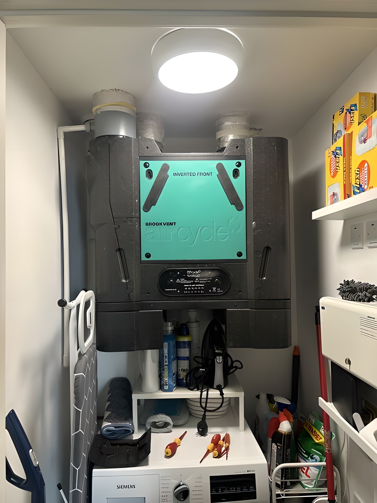 Ventilation unit in a utility cupboard